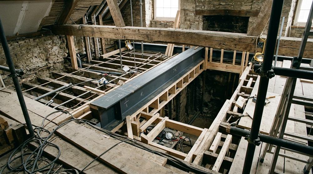 Hidden steelwork in a listed building ceiling void